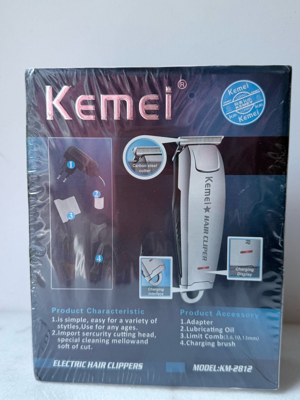Kemei KM-2812 professional hair clipper, featuring a silver stainless steel blad